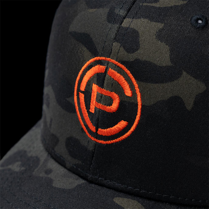 CP Logo Trucker Hat MultiCam Black/ Orange Close-up