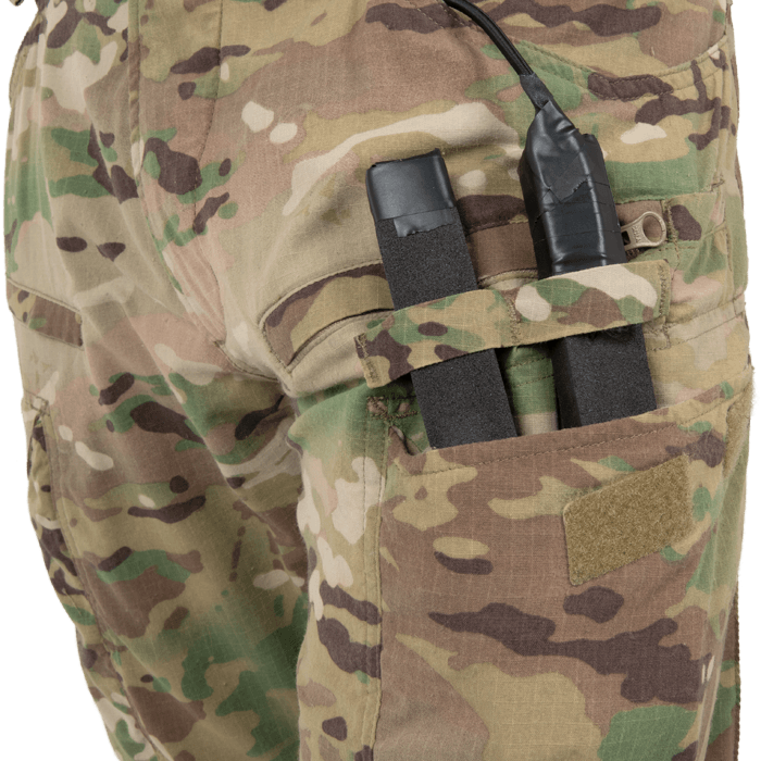 Cargo pocket pass-throughs for door charges