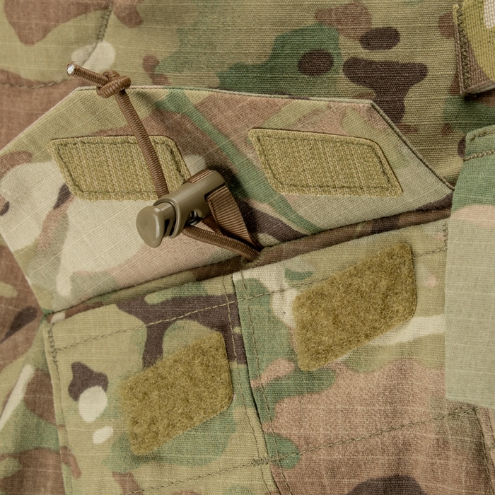 Knee height adjusters located in front thigh pocket