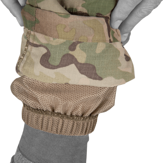 Built in lower leg gaiter for insect repellency