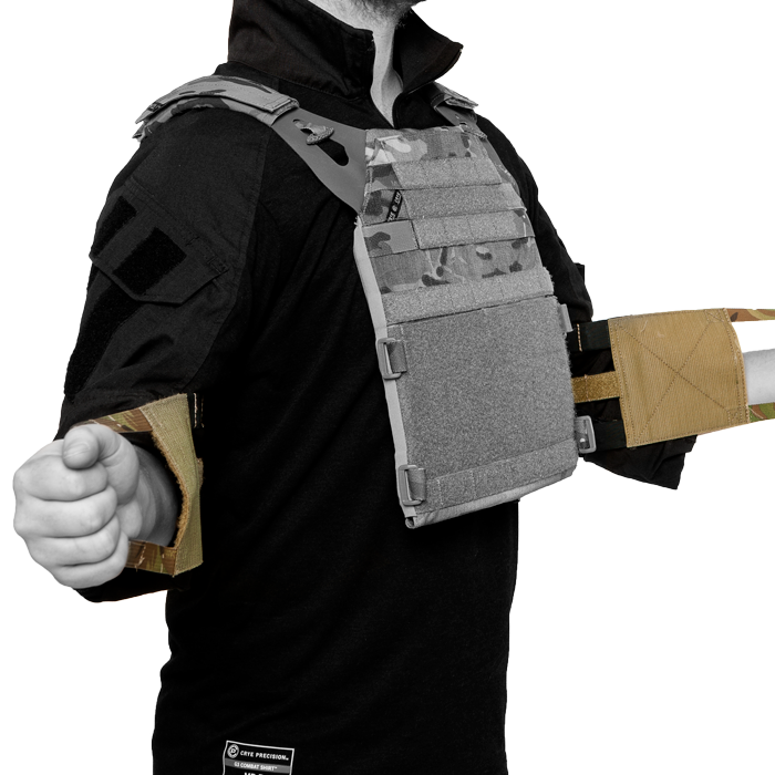 Low-profile cummerbund attachment that provides maximum adjustability and allows for chest expansion as needed